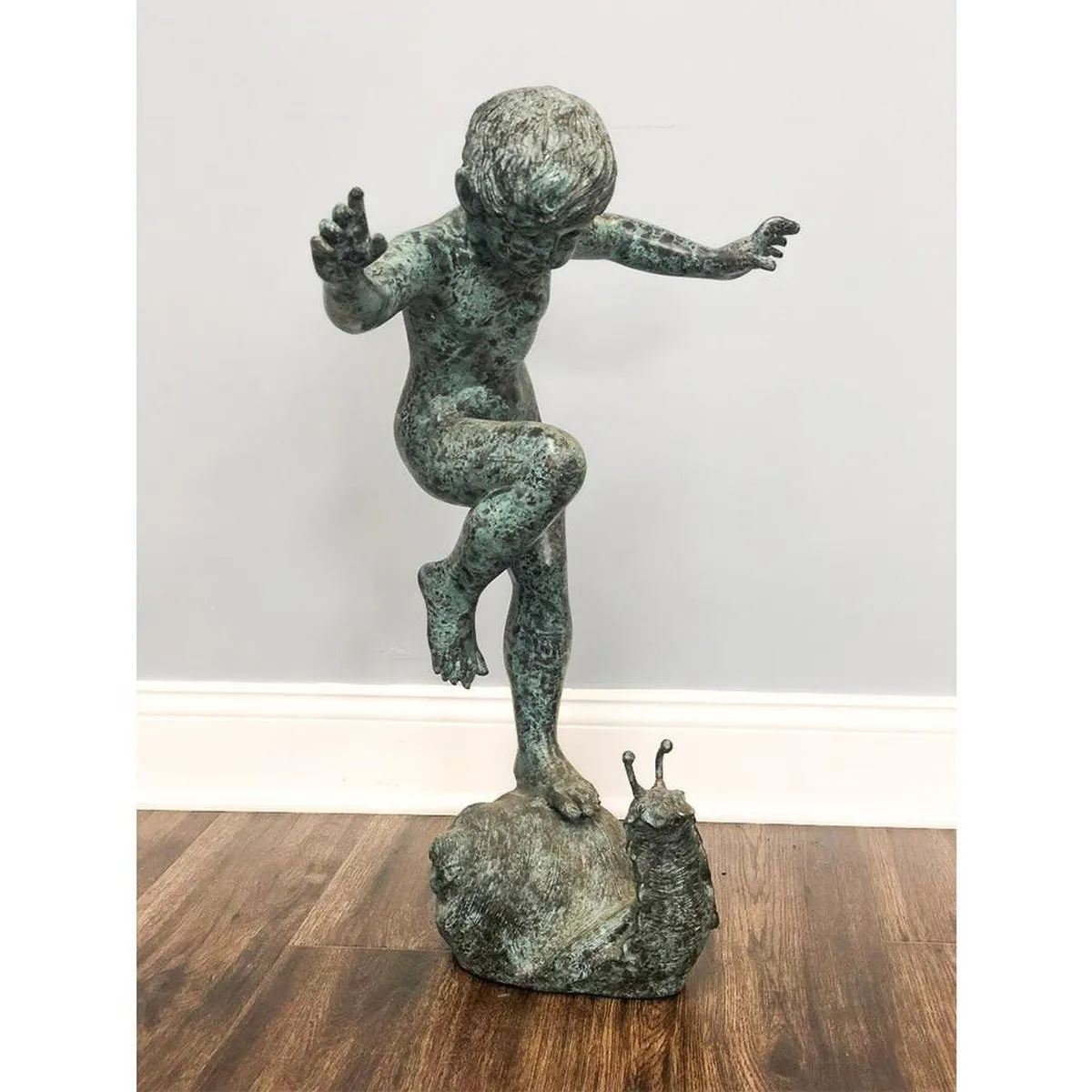 Boy Balancing on Snail