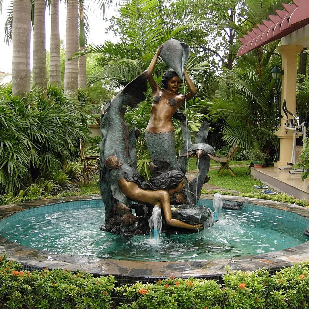 Mermaids Playing with Sea Turtle