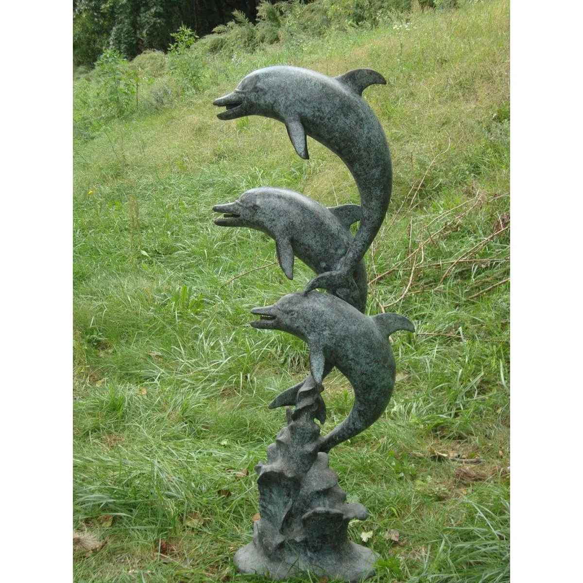 Three Dolphins on a Wave